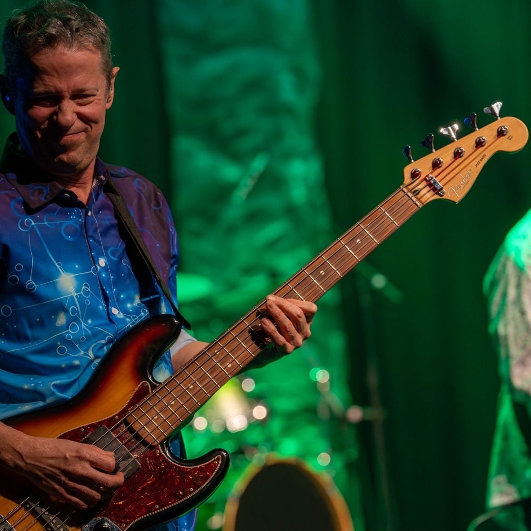 guitarist is rocking out curing concert